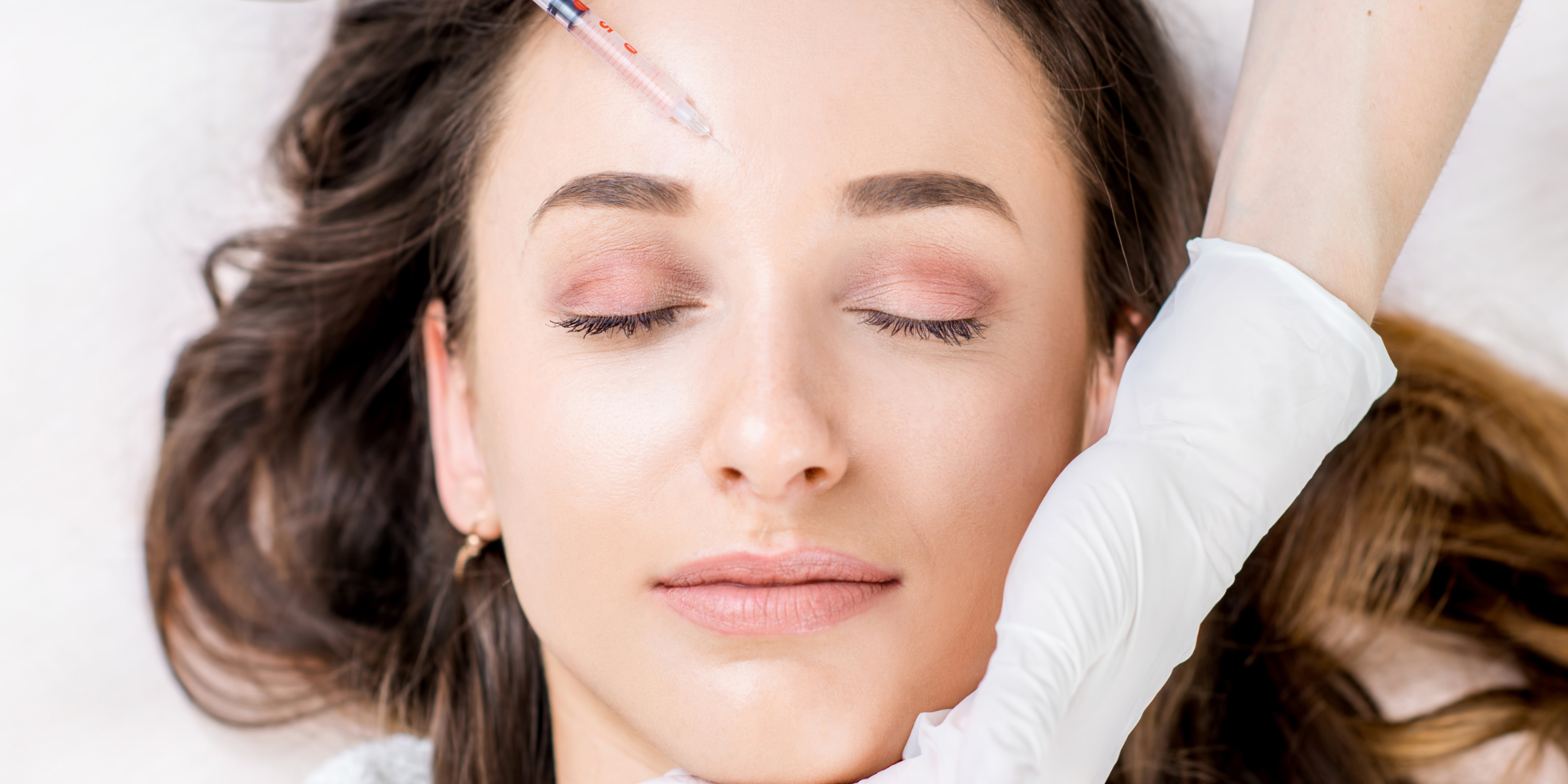 Woman receiving a BOTOX® Cosmetic injection