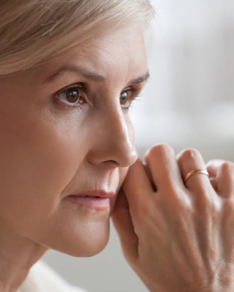 Older woman looking concerned