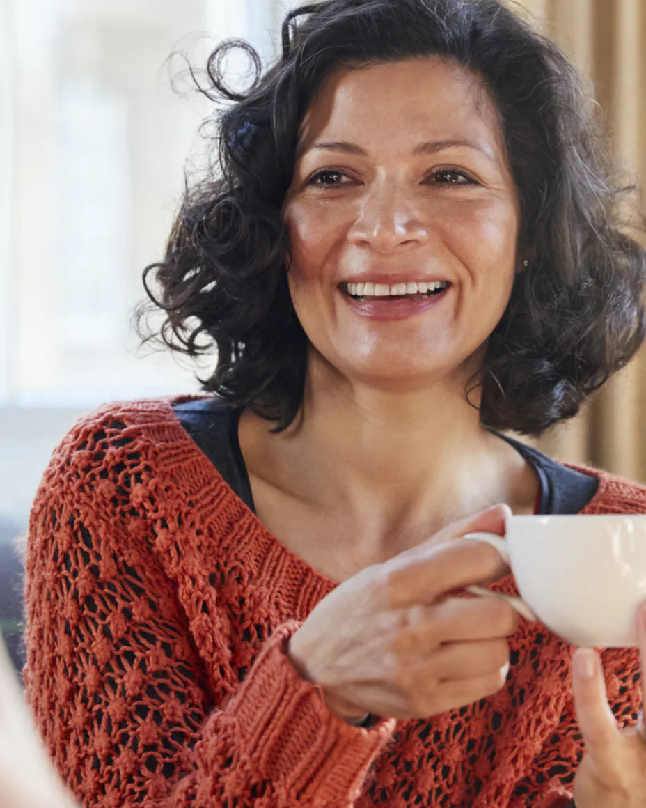 Woman holding a cup of tea