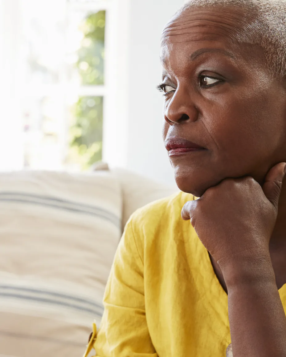 woman sitting on the couch